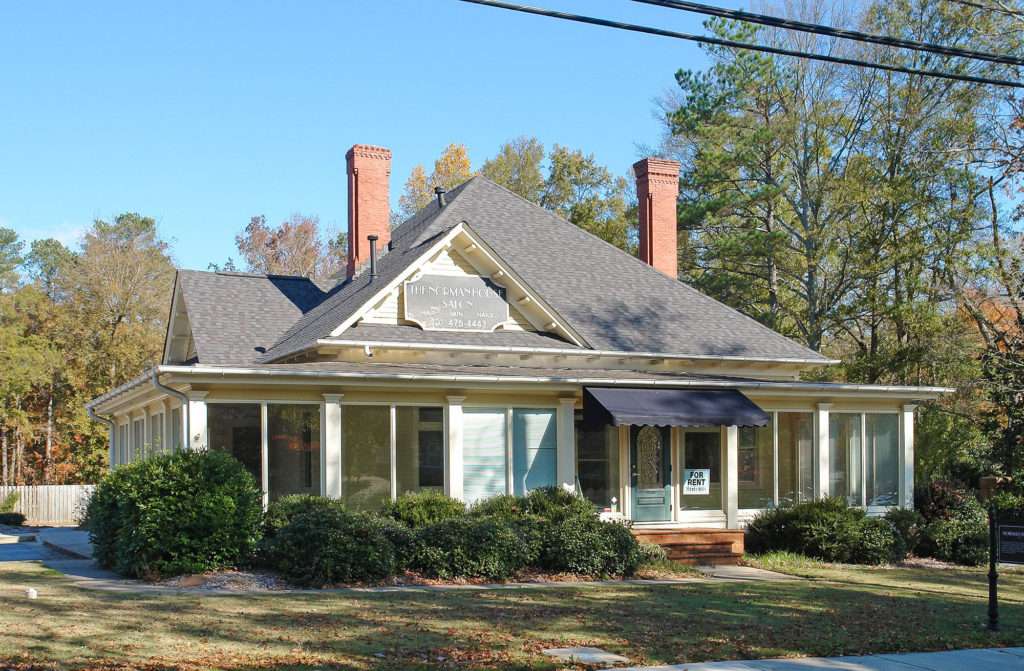 Exterior view of The Norman House at 18 Cumming Street, Alpharetta, GA, leased by Stratus Property Group.