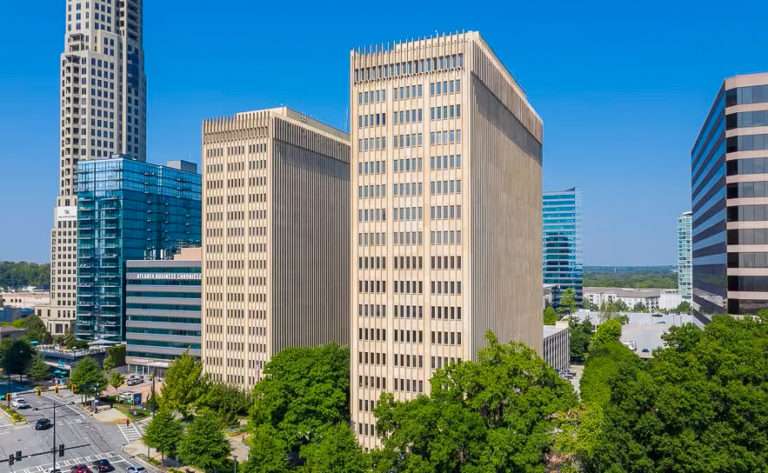 Exterior view of Lenox Towers at 3400 Peachtree Road NE, Atlanta, GA, where Stratus Property Group facilitated an office lease for an Atlanta-based law firm.