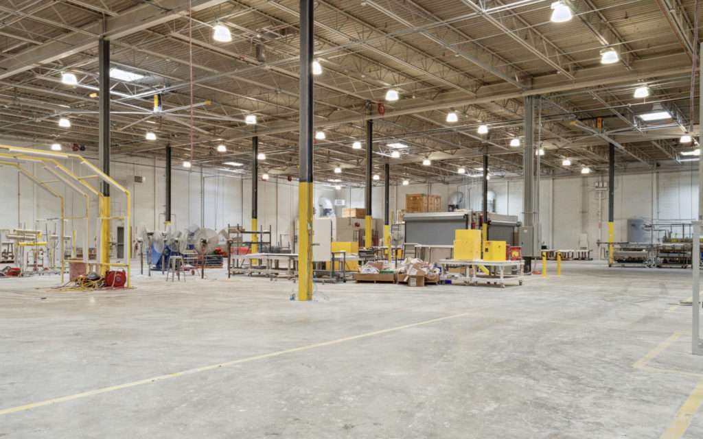 Interior view of the 42,000 sq ft industrial building at 85 Walnut St, Commerce, GA, sold by Stratus Property Group.