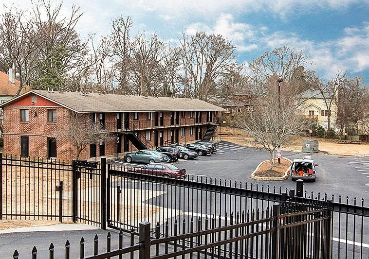 Exterior view of Amberwood Village Apartments at 180 Flat Shoals Ave SE, Atlanta, GA, sold by Stratus Property Group.