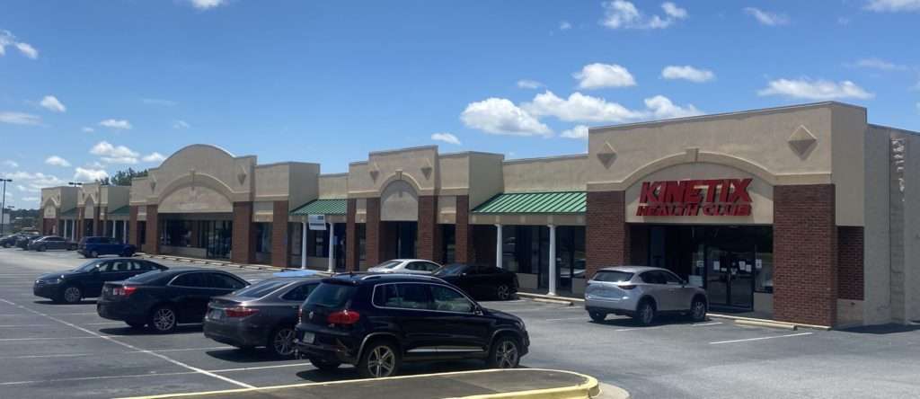 Exterior view of Jasmine Place Retail Center at 115 Margie Drive, Warner Robins, GA, sold by Stratus Property Group.