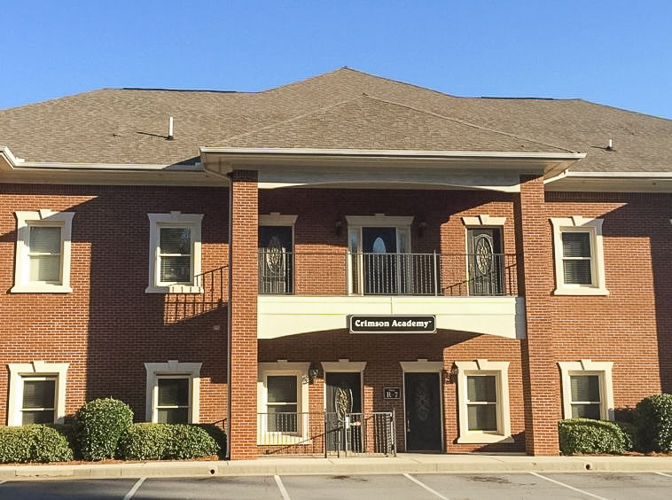 Exterior view of Magnolia Office Park at 1400 Buford Hwy, Sugar Hill, GA, leased and sold by Stratus Property Group.