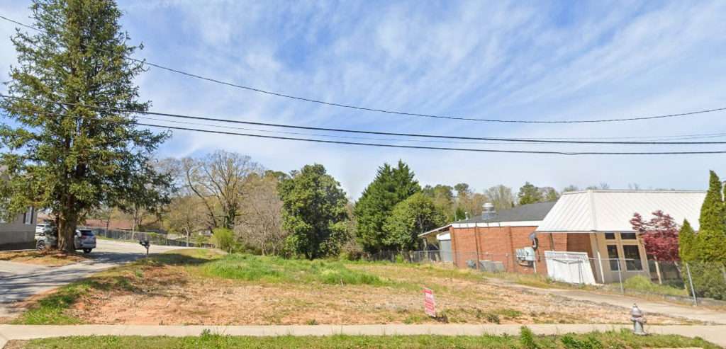 Street view of the 0.55-acre development site at 1003 Maple Street, Carrollton, GA, near the University of West Georgia.