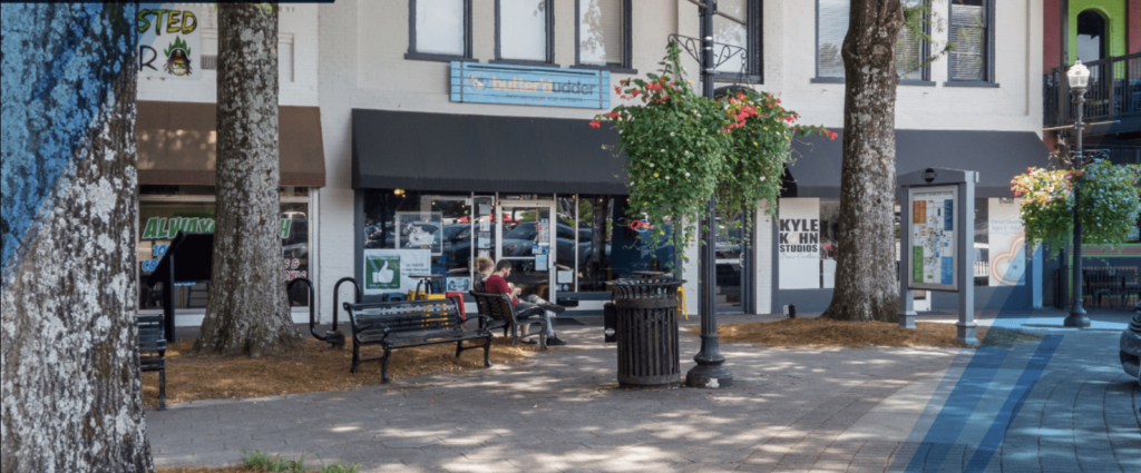 Exterior view of Adamson Square Lofts in downtown Carrollton, GA, sold by Stratus Property Group.