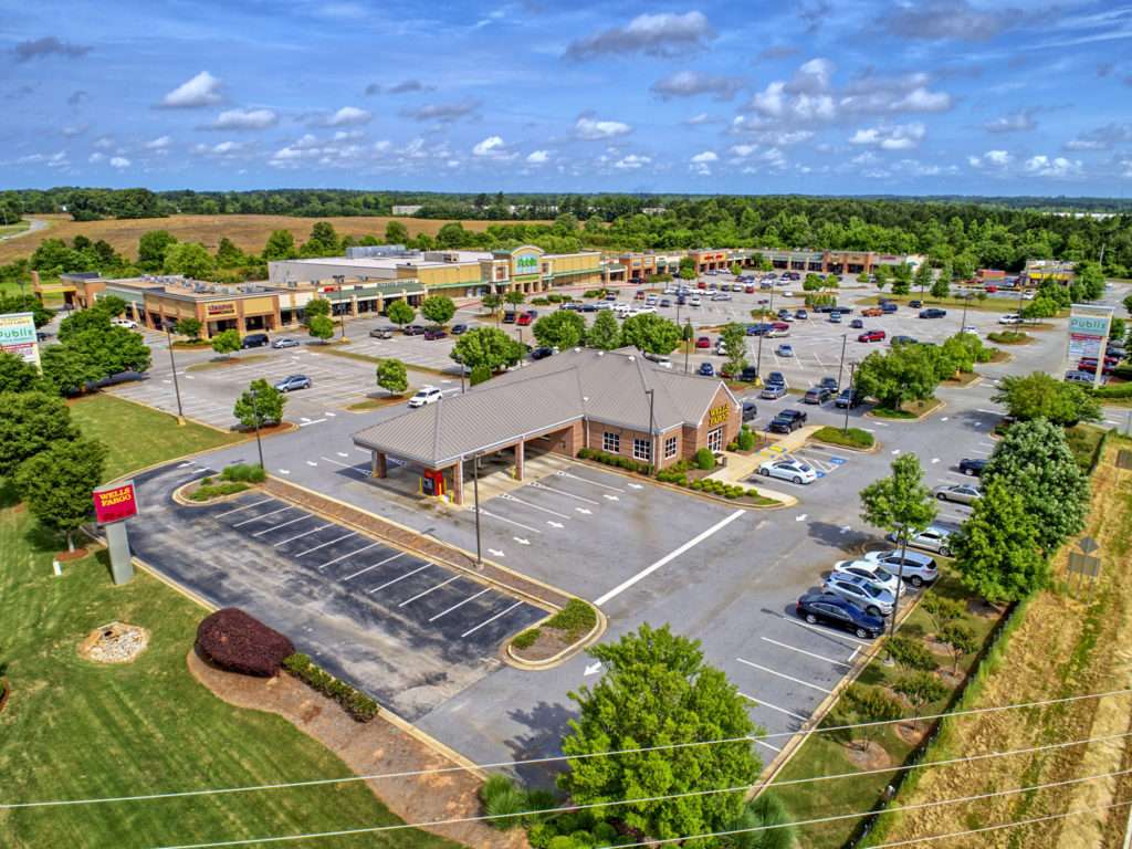 Exterior view of The Shoppes at Locust Grove at 2730 Hwy 155, Locust Grove, GA, leased by Stratus Property Group."