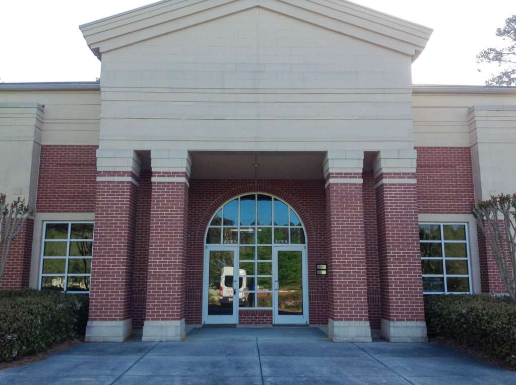 Exterior view of the newly renovated 18,000 sq ft office space at 105 Westpark Drive, Athens, GA, leased by Stratus Property Group.