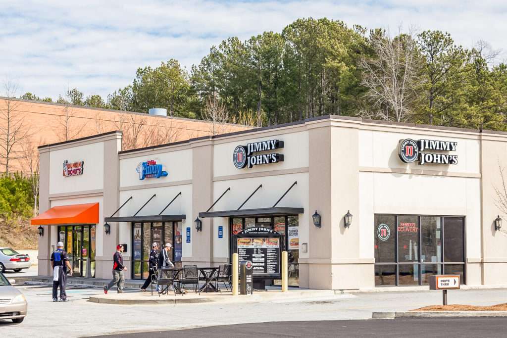 Exterior view of The Shoppes at Cascade retail property in Atlanta, GA, sold by Stratus Property Group.