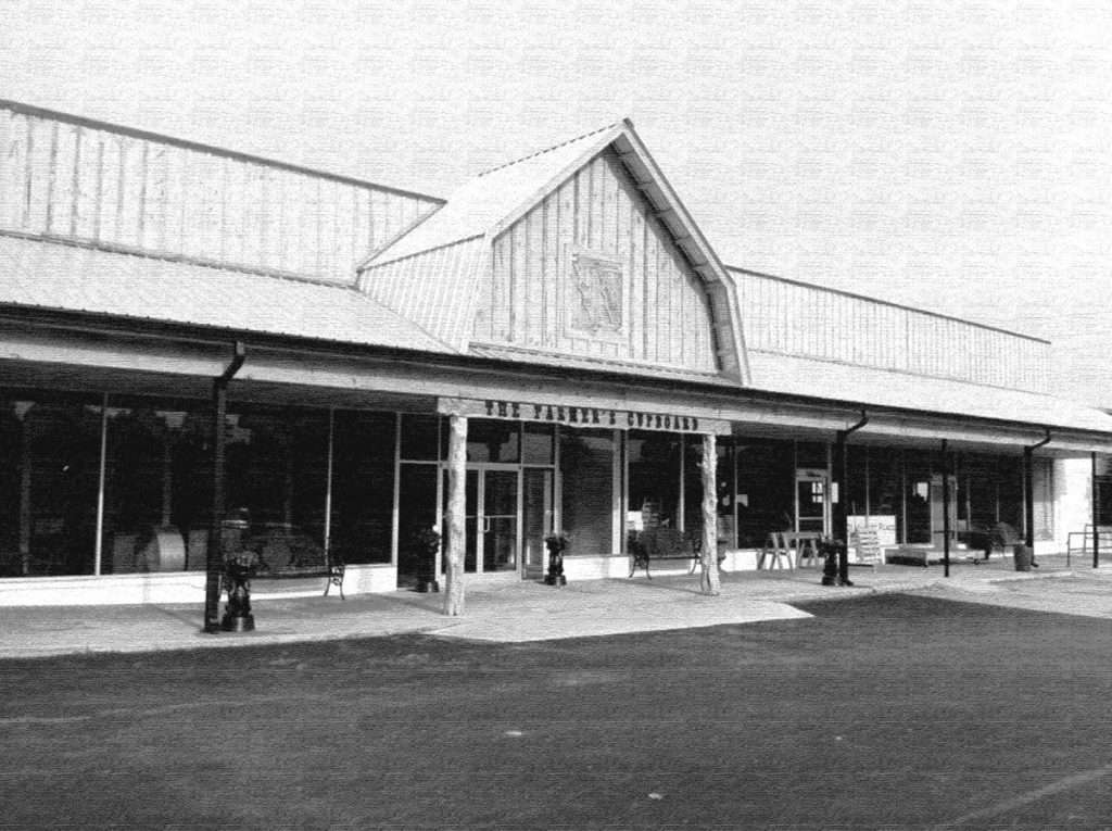 Historic exterior view of the newly acquired retail center at 415 Rome Street in downtown Carrollton, GA, by Stratus Property Group.