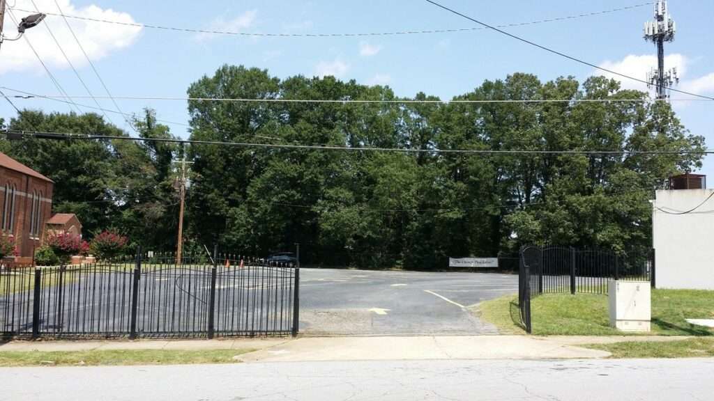 Paved and fenced 0.39-acre commercial lot at 0 Westhaven Drive, Atlanta, GA 30311.