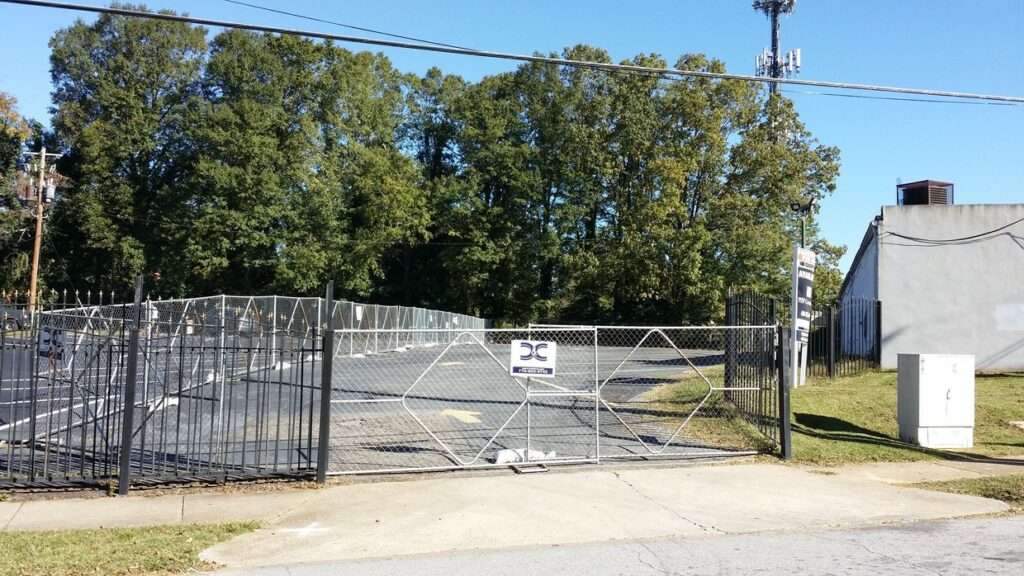 Paved and fenced 0.39-acre commercial lot at 0 Westhaven Drive, Atlanta, GA 30311.